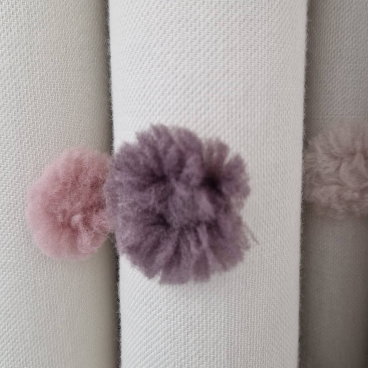 Joy 02 drapery, 3D pattern with pink and purple polka dots woven in relief, ivory background