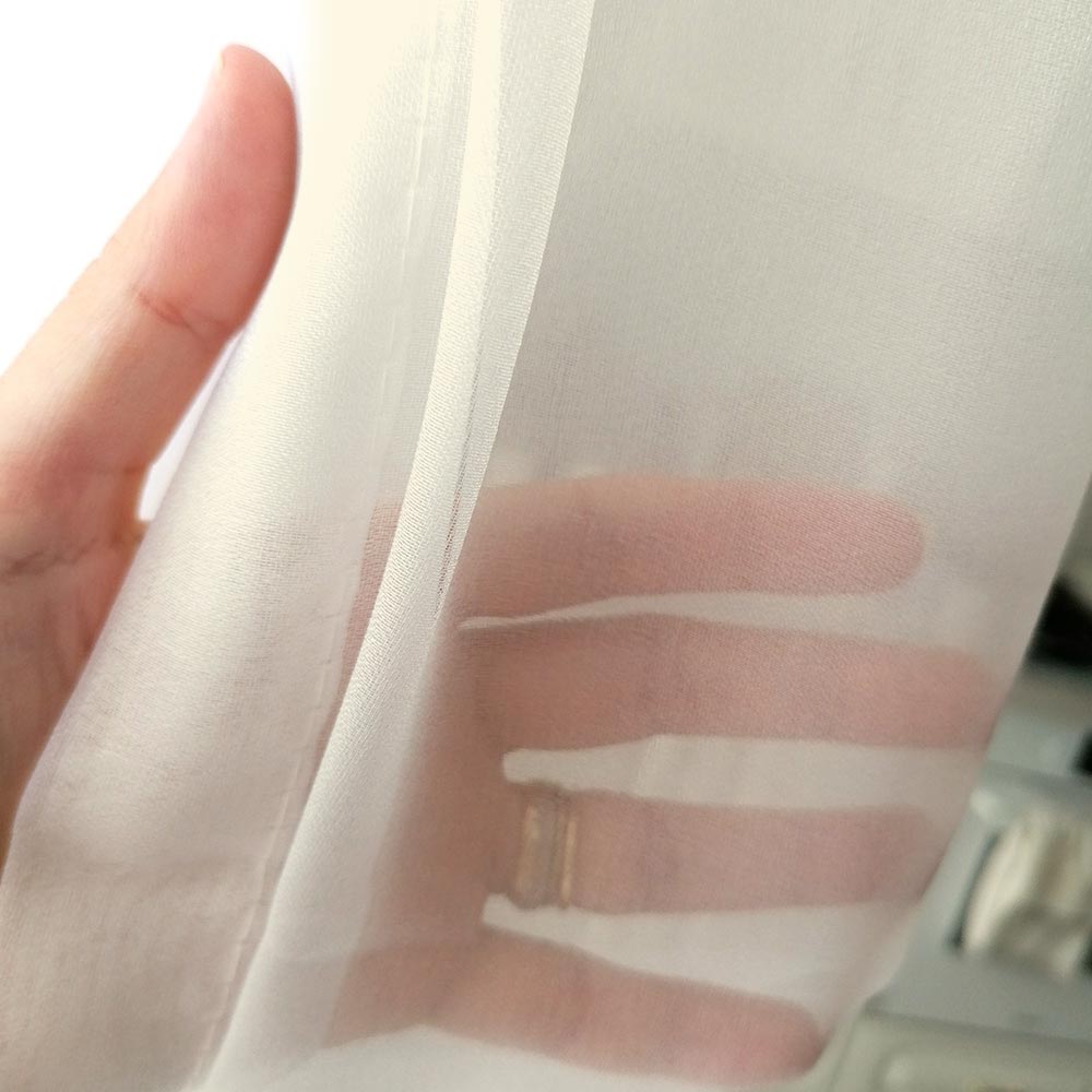 Sheer curtain with wide drapery